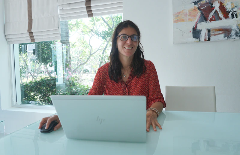focused woman working at a modern bright table