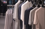 Clothes are hanging on a rack.