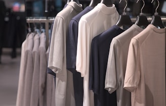 Clothes are hanging on a rack.