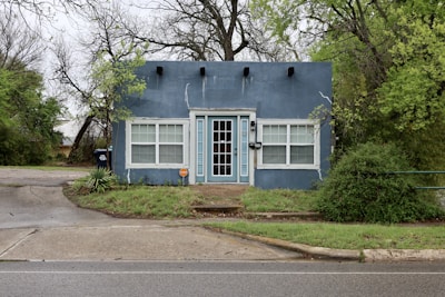 A blue building with white trim.