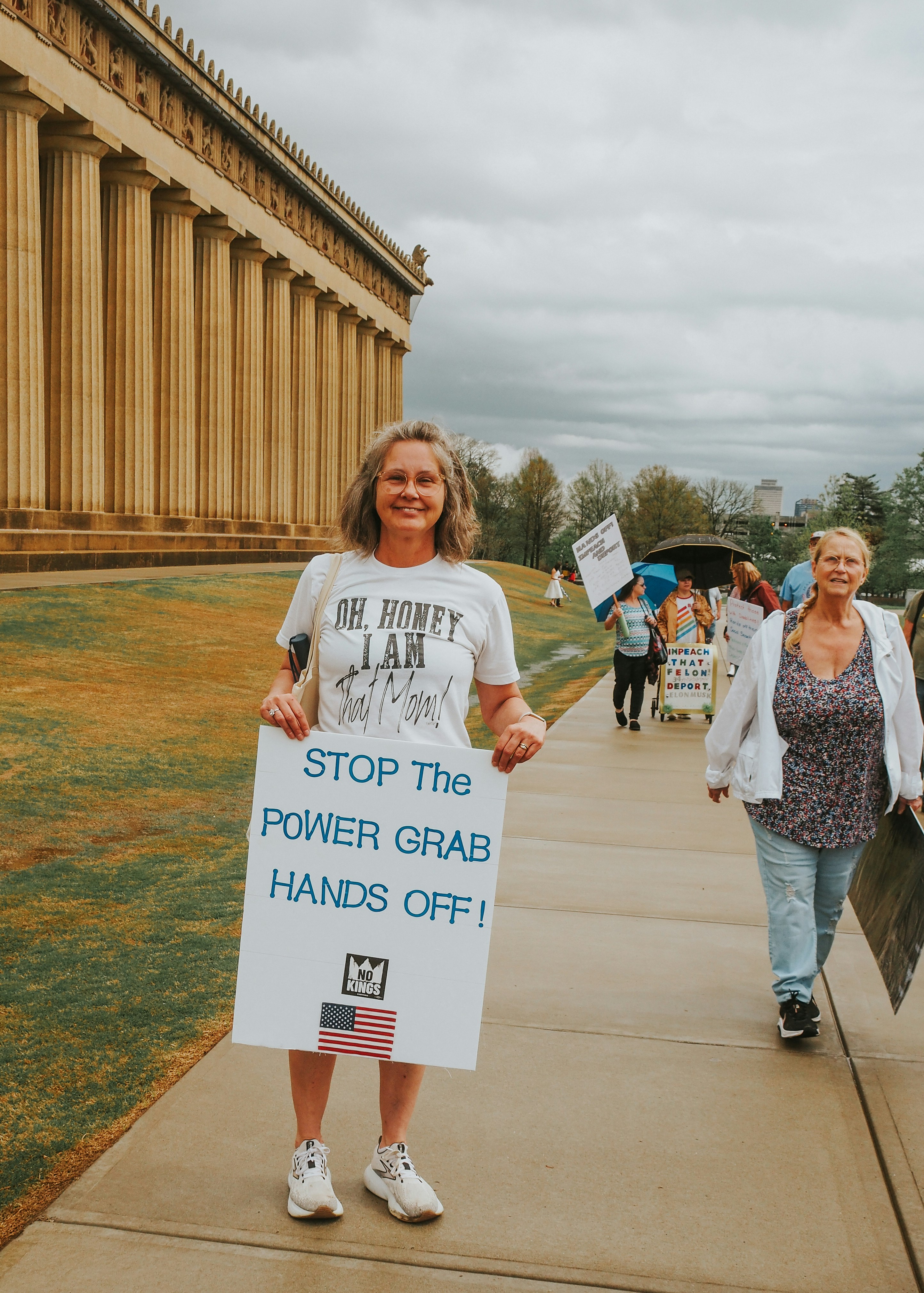 Woman protests with a sign about power. photo – Free Woman Image on ...