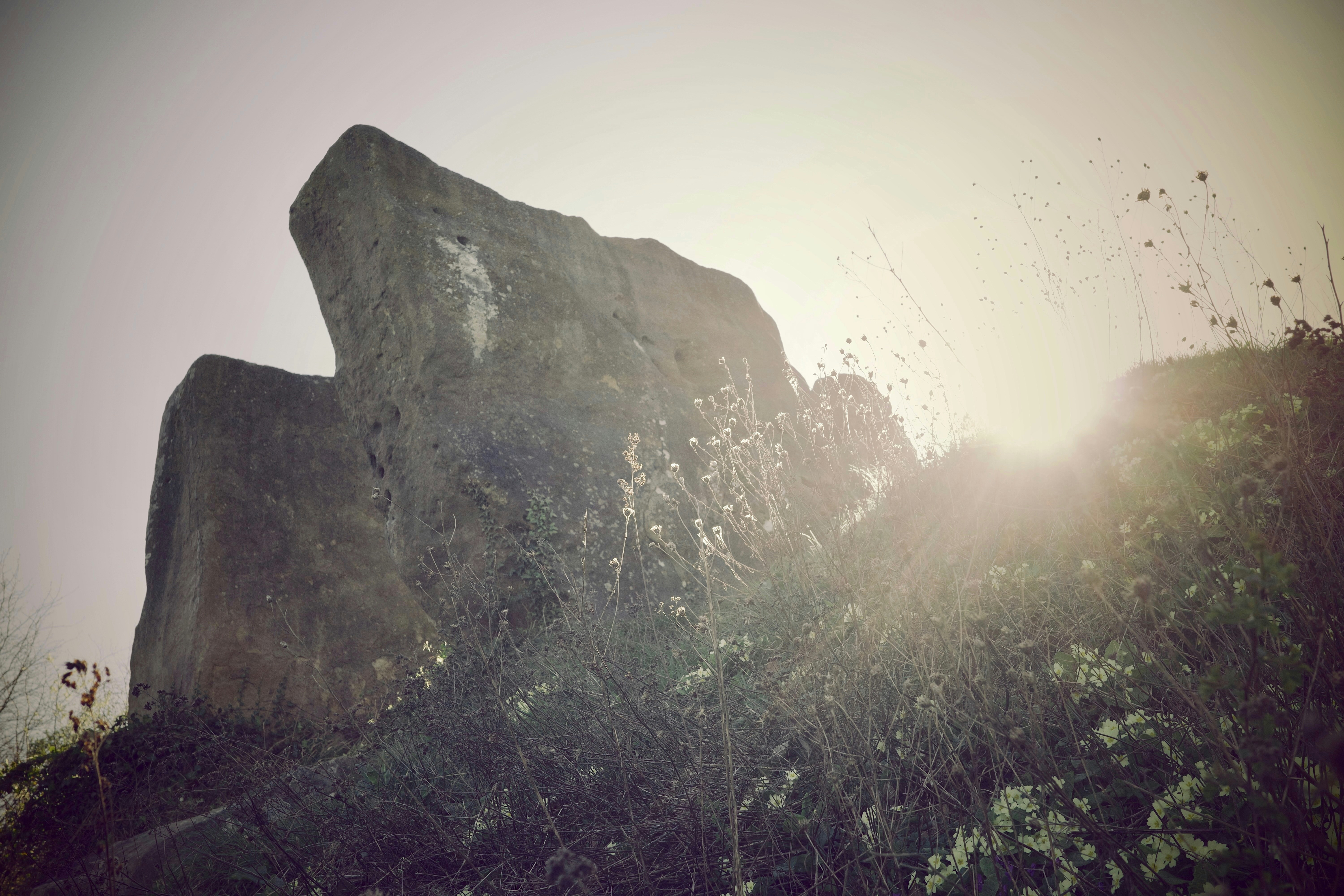 A large rock formation with sunlight. photo – Free Rock Image on Unsplash
