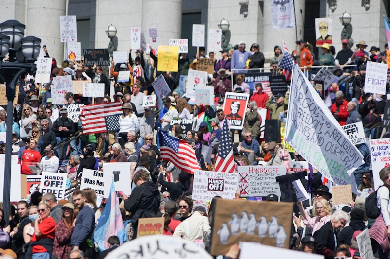 protest march, demonstration crowd, political rally, street protest, activist gathering
