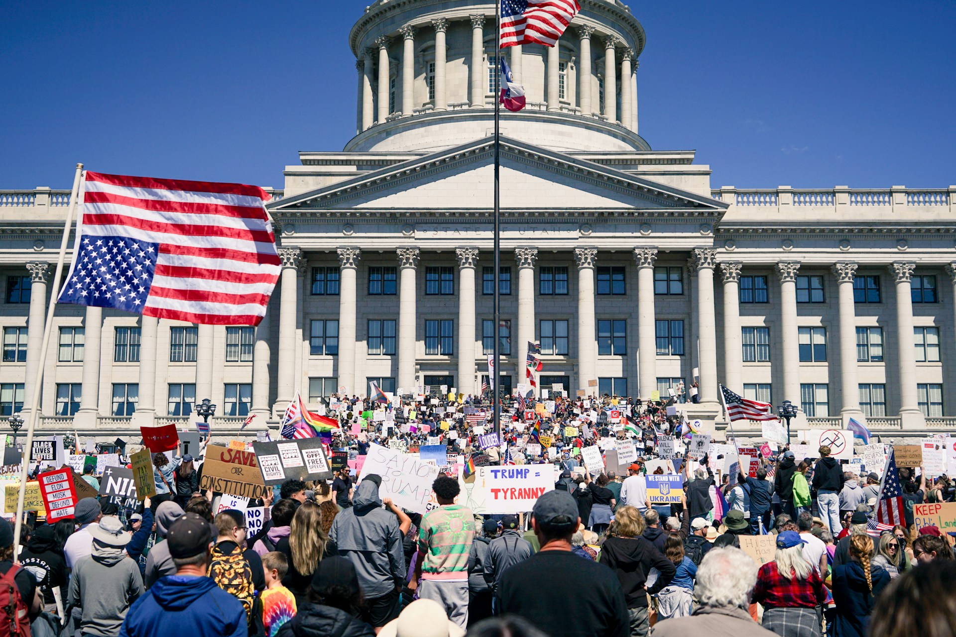 Protestors gather at a government building.