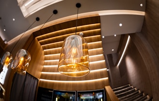 Stylish, warm lighting hangs in an interior space.