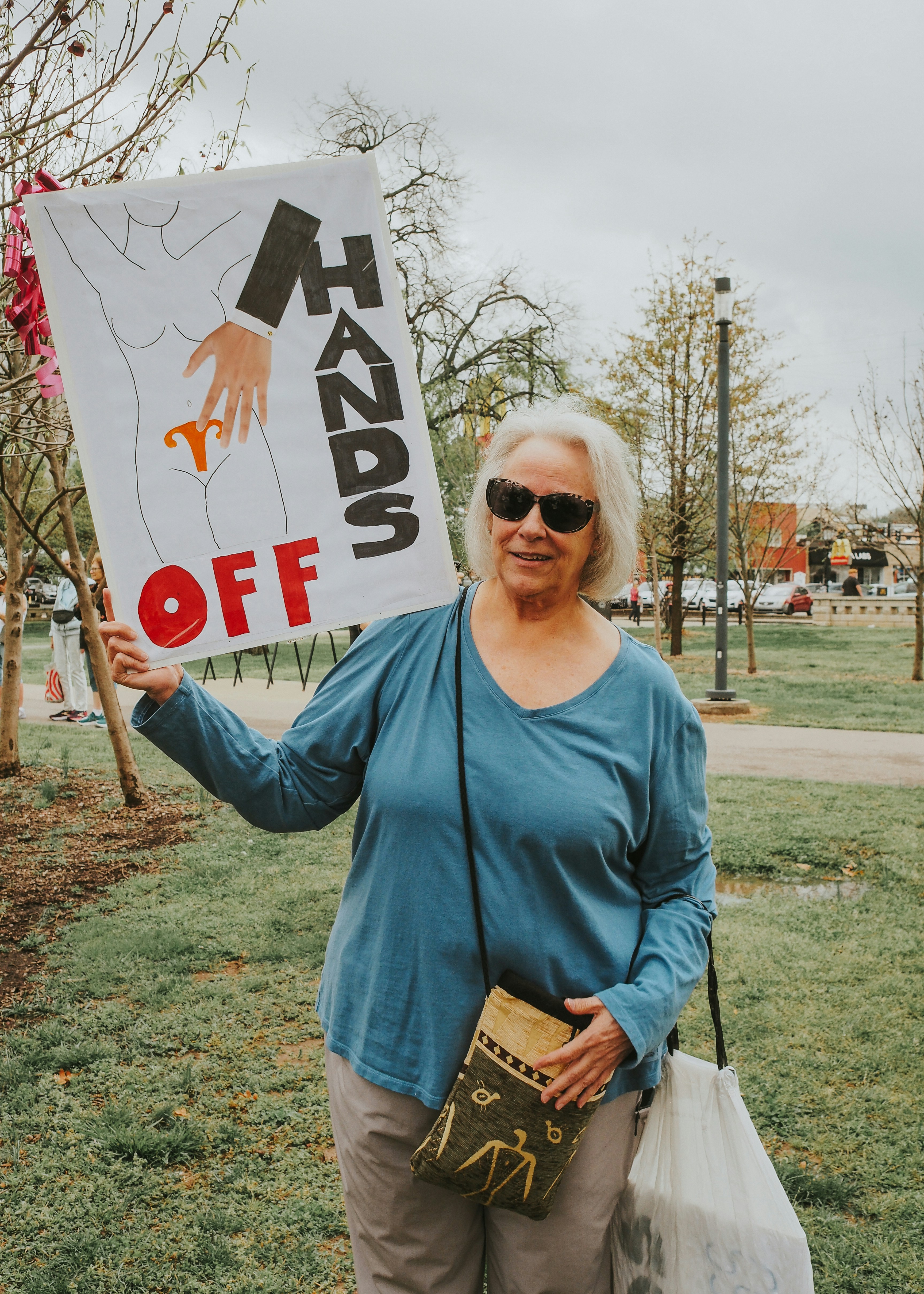 Woman protests with a \