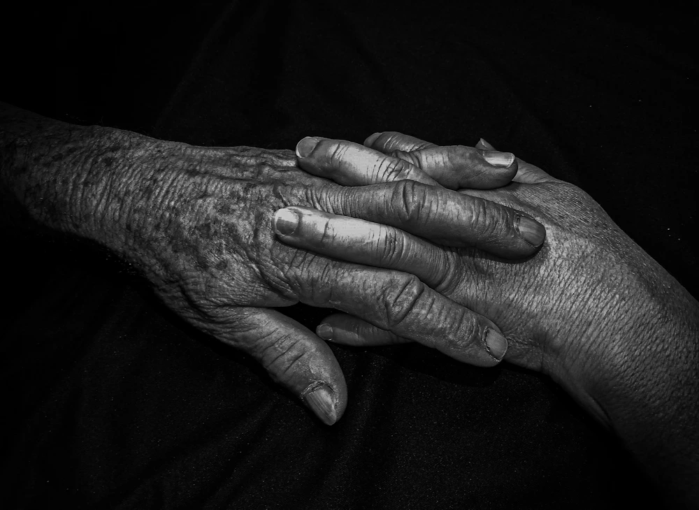 Hands held together