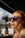 A woman in sunglasses gazes away