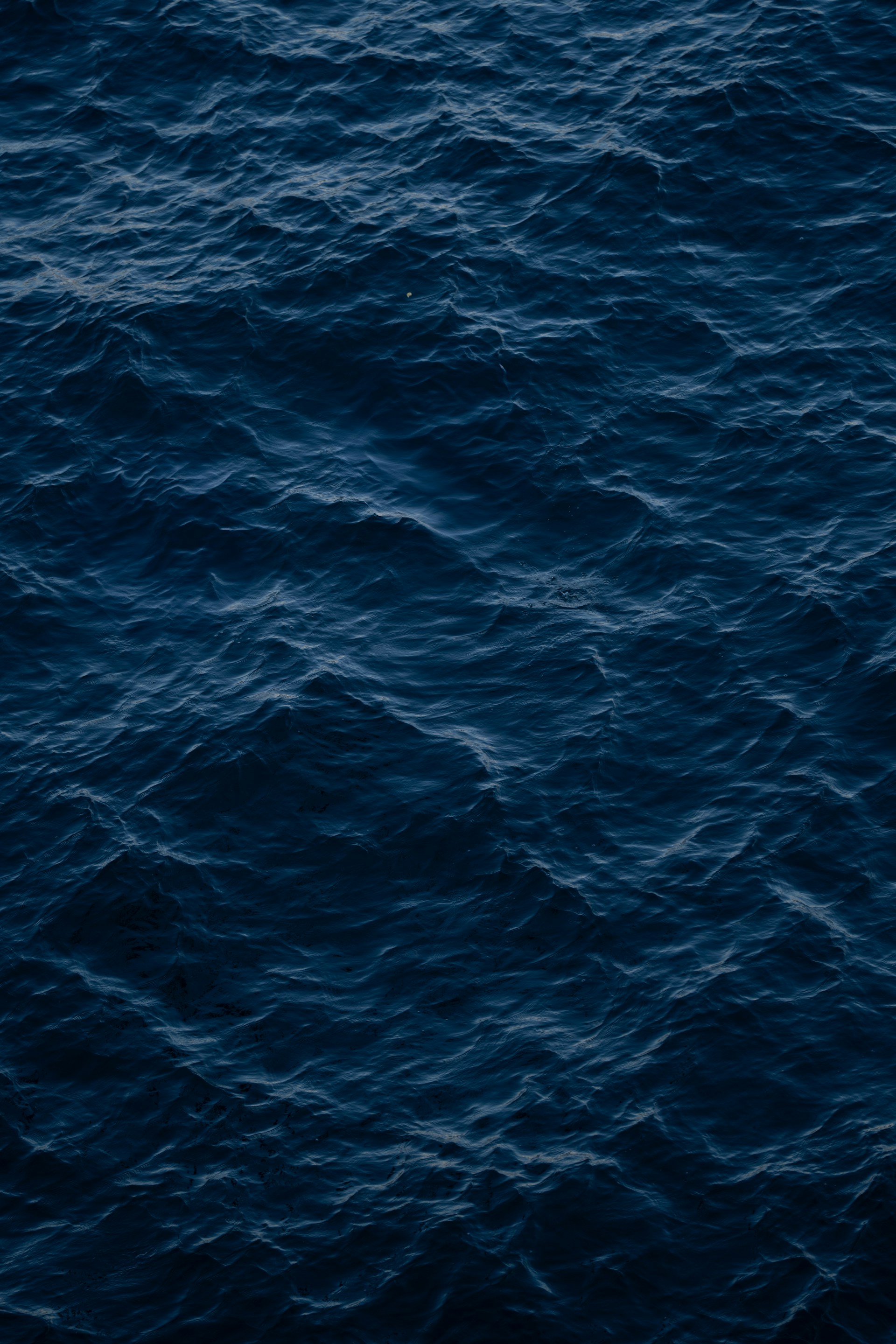 Deep blue ocean waves in motion.