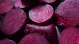 Freshly cut beets displayed in macro close-up.