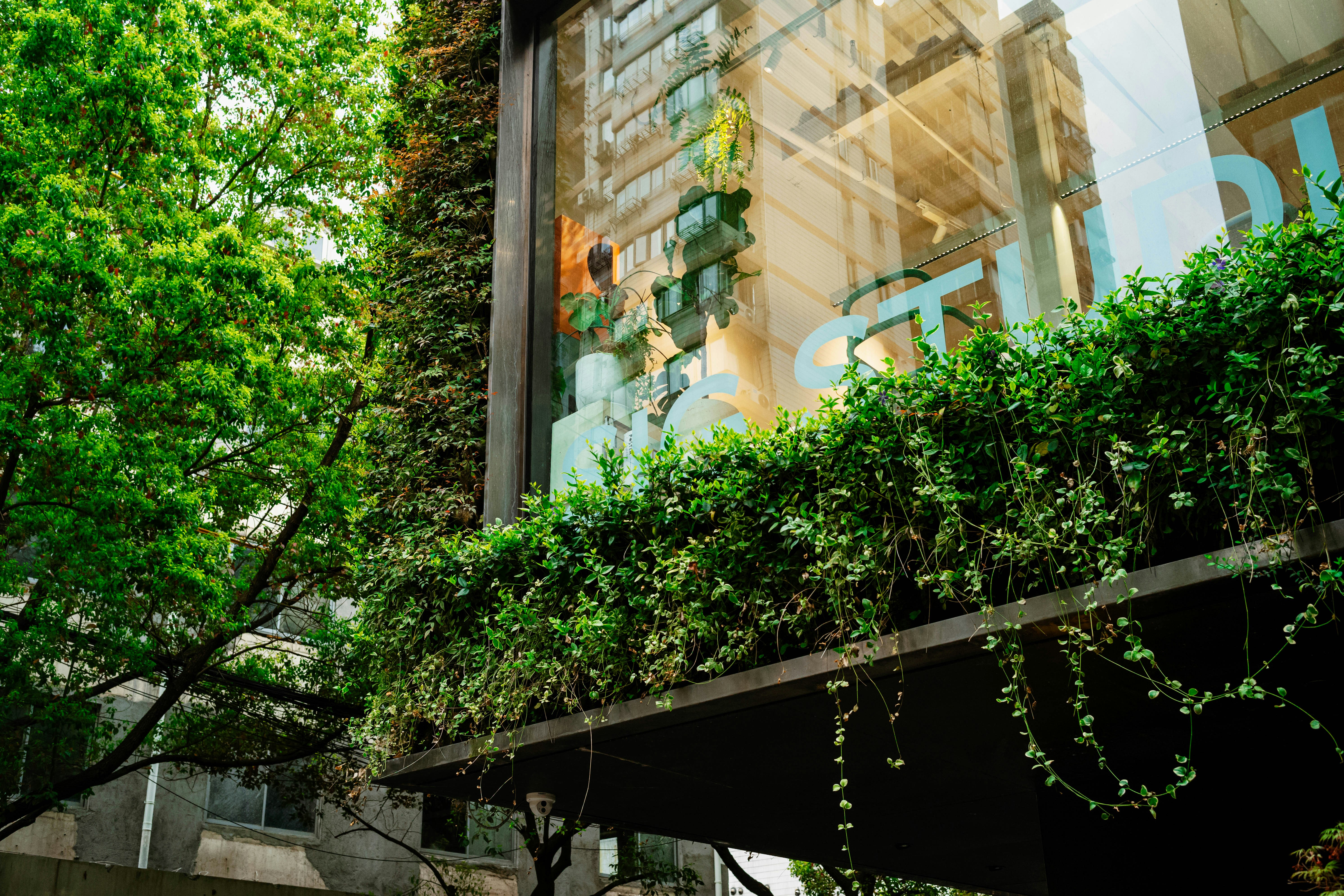 Building exterior with integrated greenery