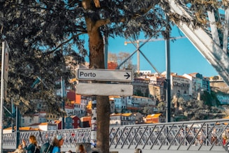 Signs point towards the city of porto.