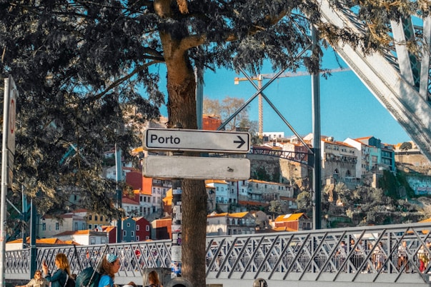 Signs point towards the city of porto.