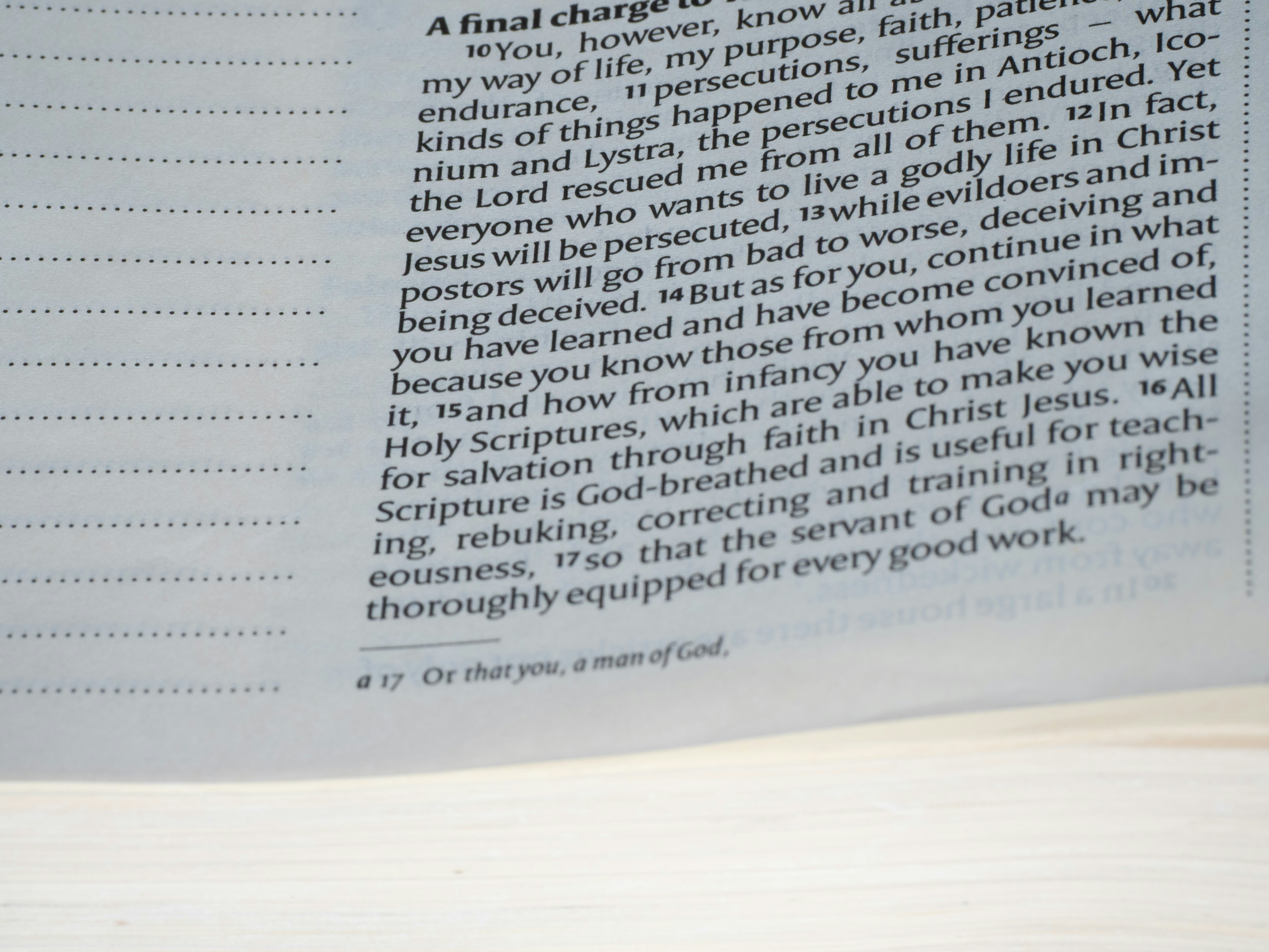 Text from the bible is shown on the page.