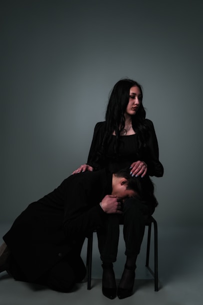 A woman comforts another woman.