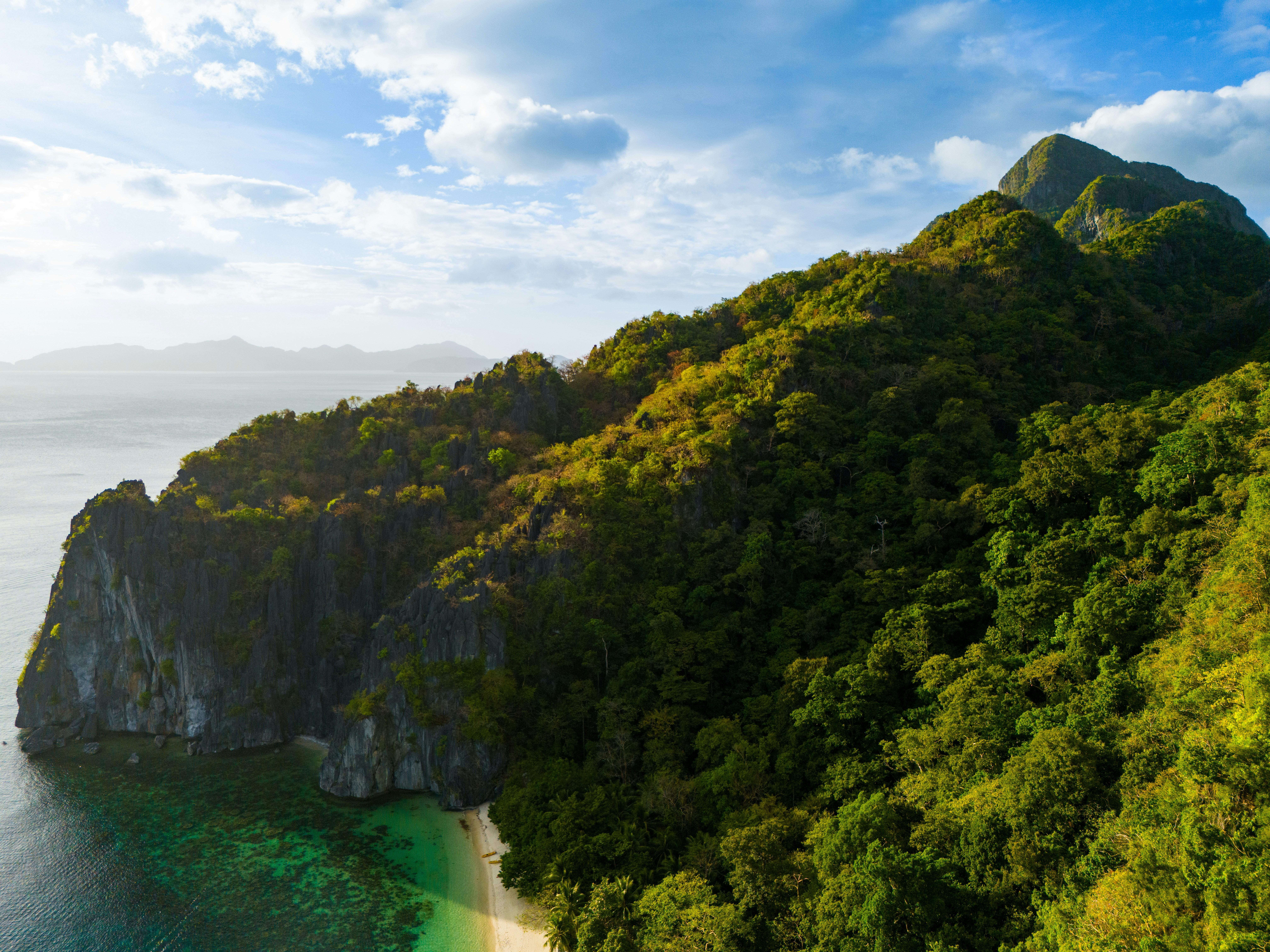Drone view of karst peaks and sea in El Nido, Palawan, Philippines.