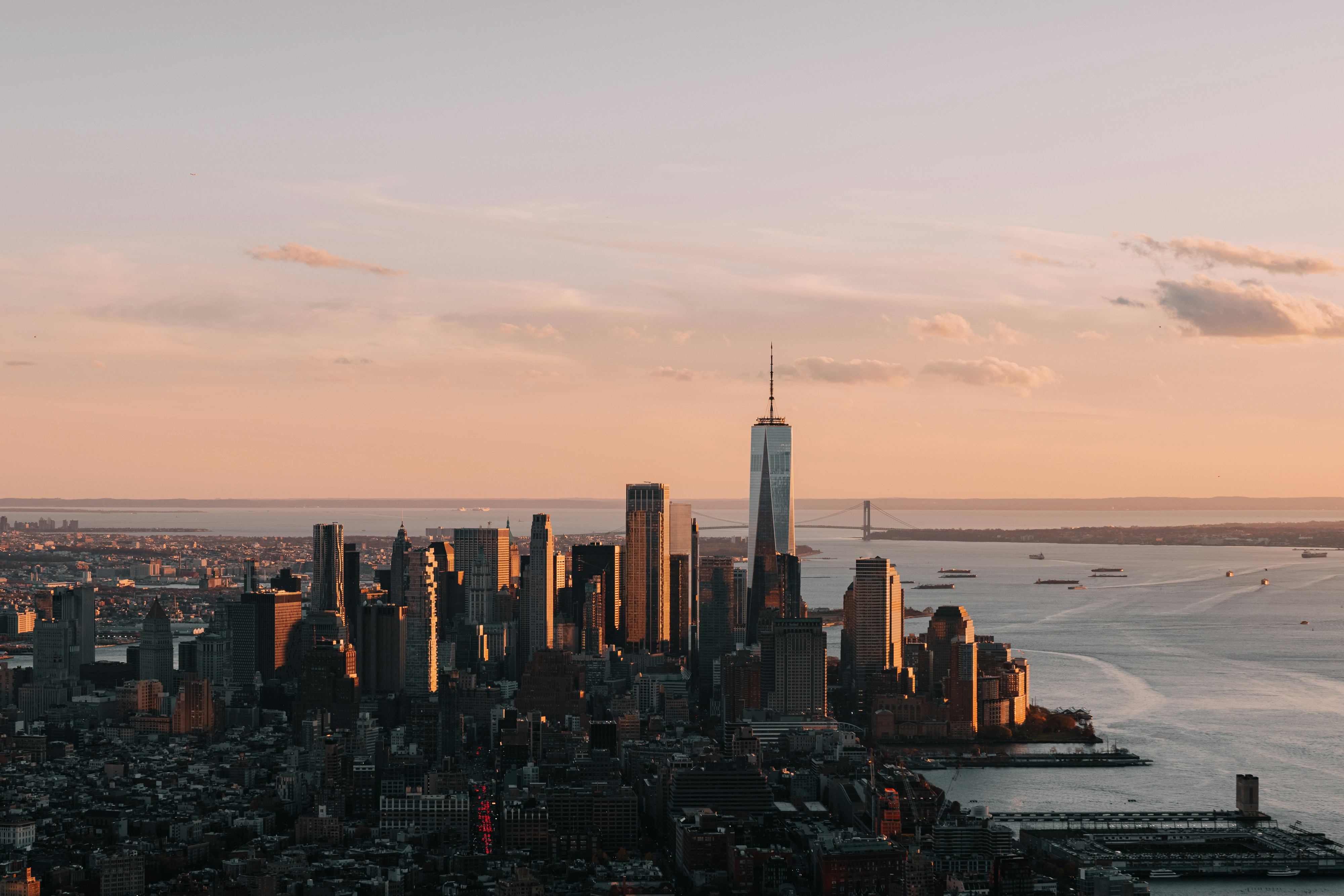 A skyline of new york city at sunset.