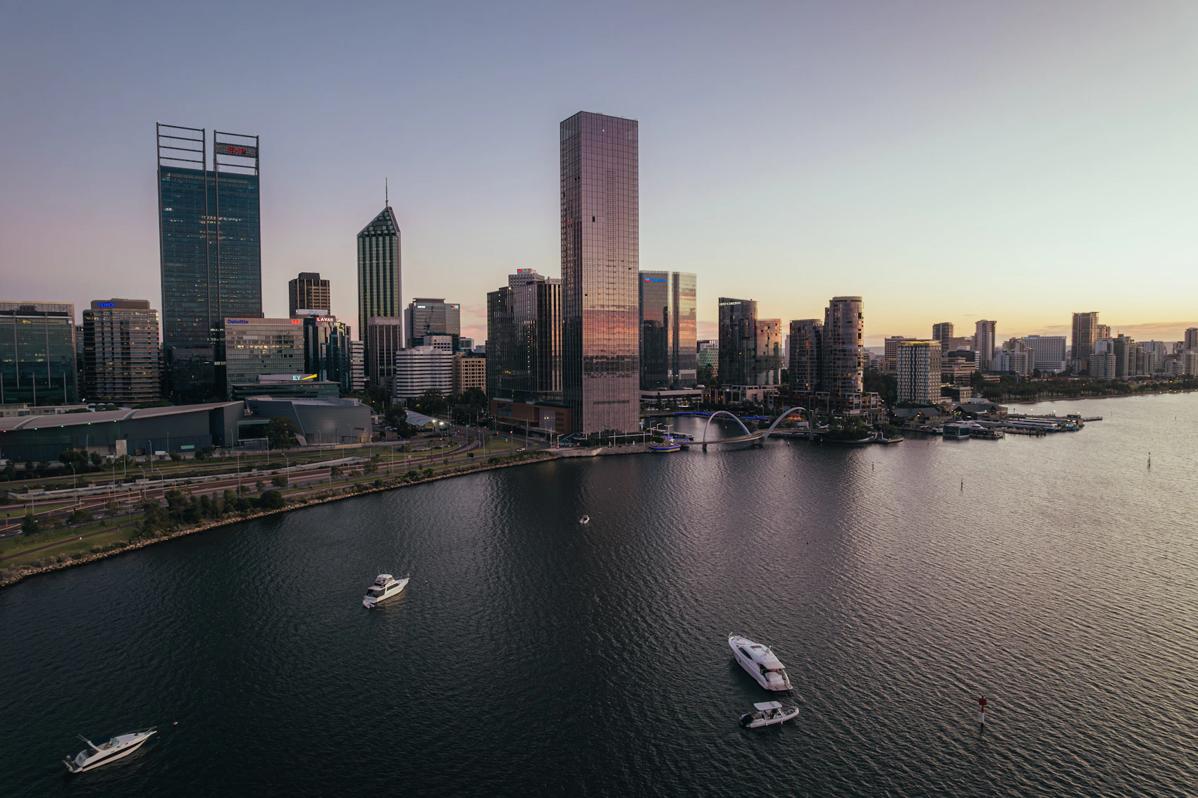 Perth skyline and boats seen across the Swan River