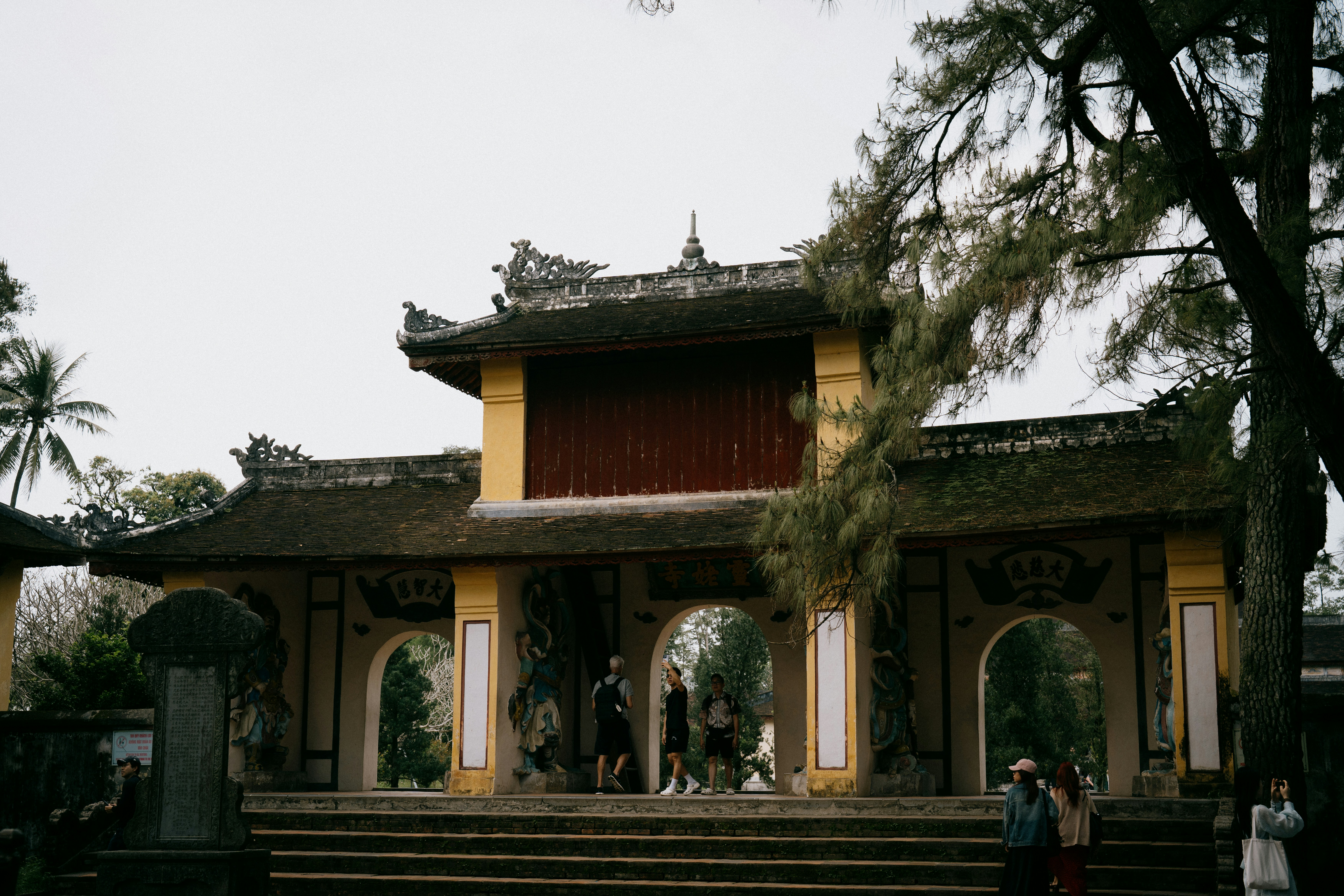 An ornate traditional gate at a historical site.