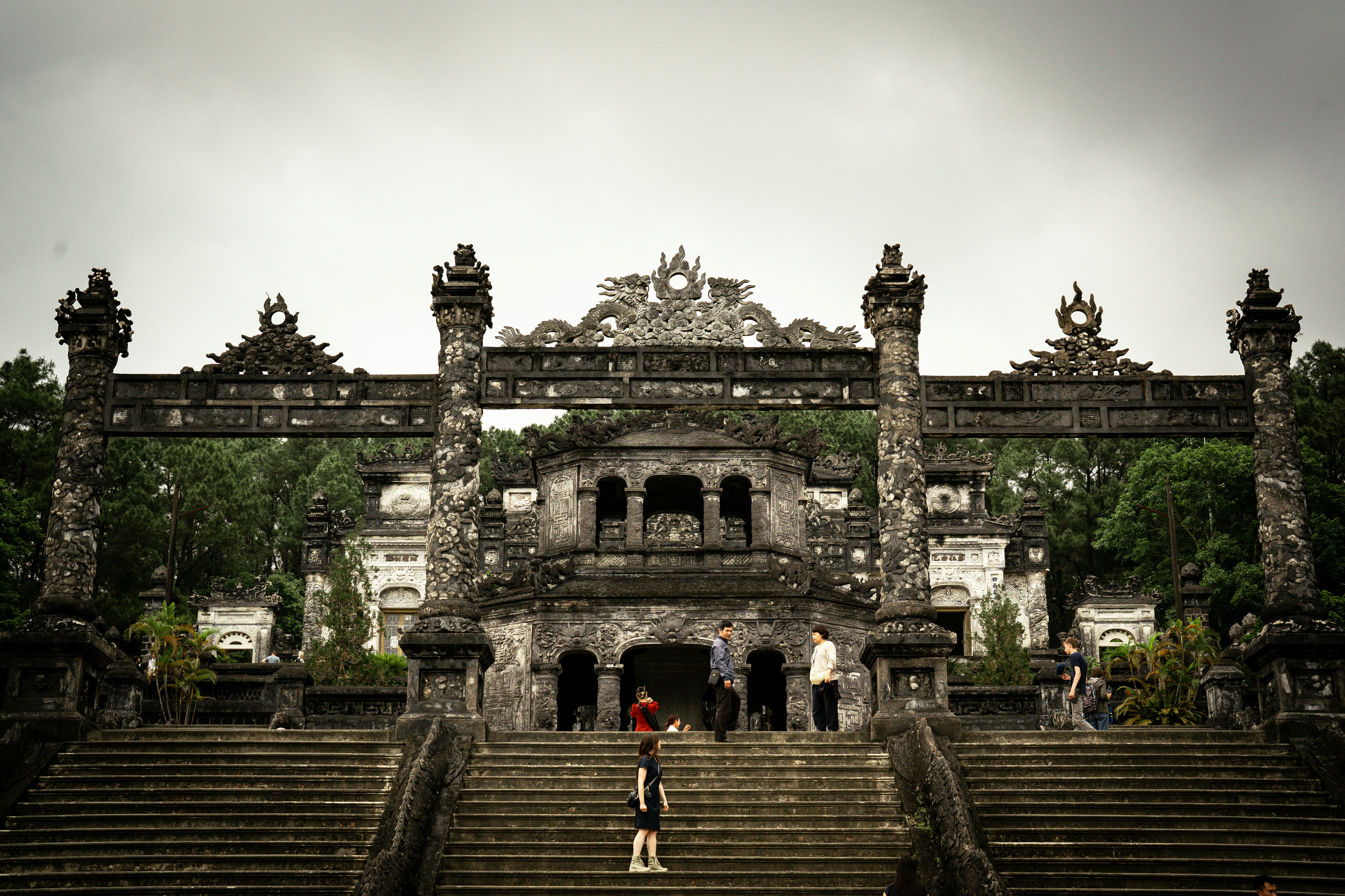 A grand, aged building with stone stairs.