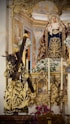 Statues of jesus carrying cross and virgin mary.
