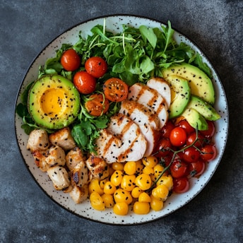 Chicken salad with avocado and tomatoes.