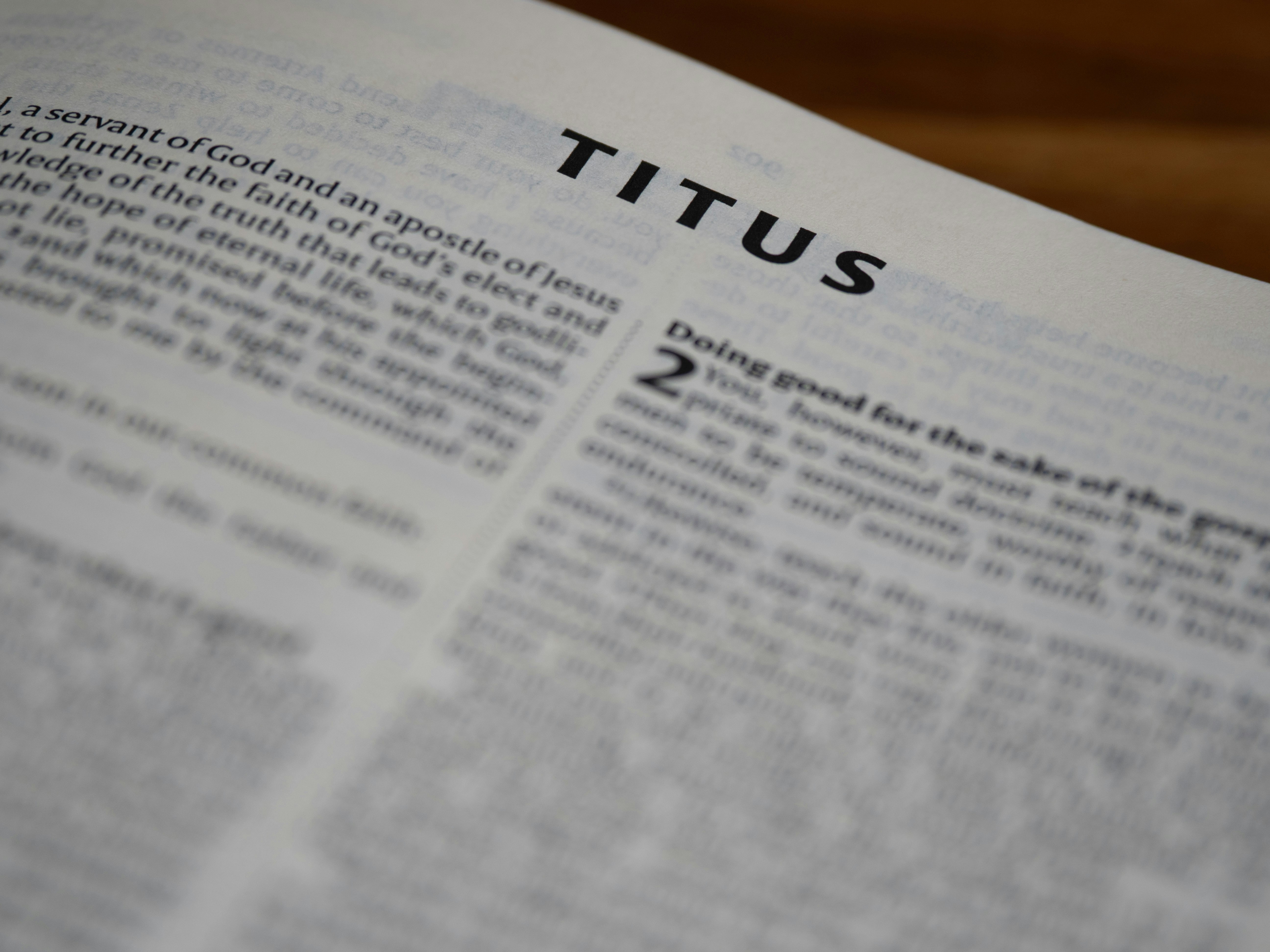 The book of titus lies open.