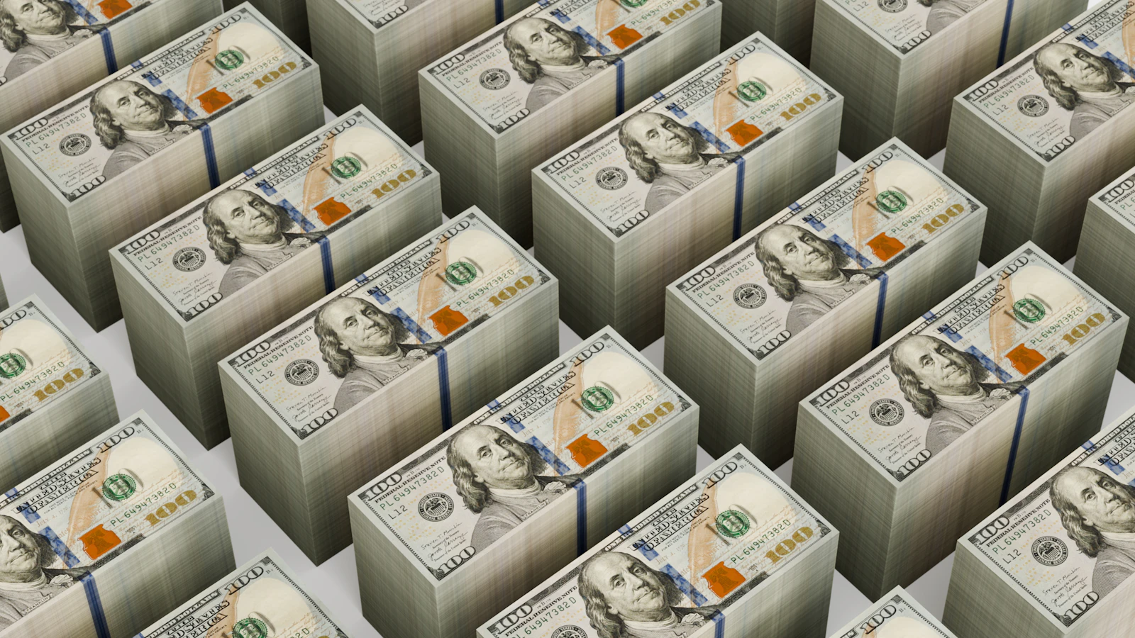 Neat stacks of one hundred dollar bills arranged in rows