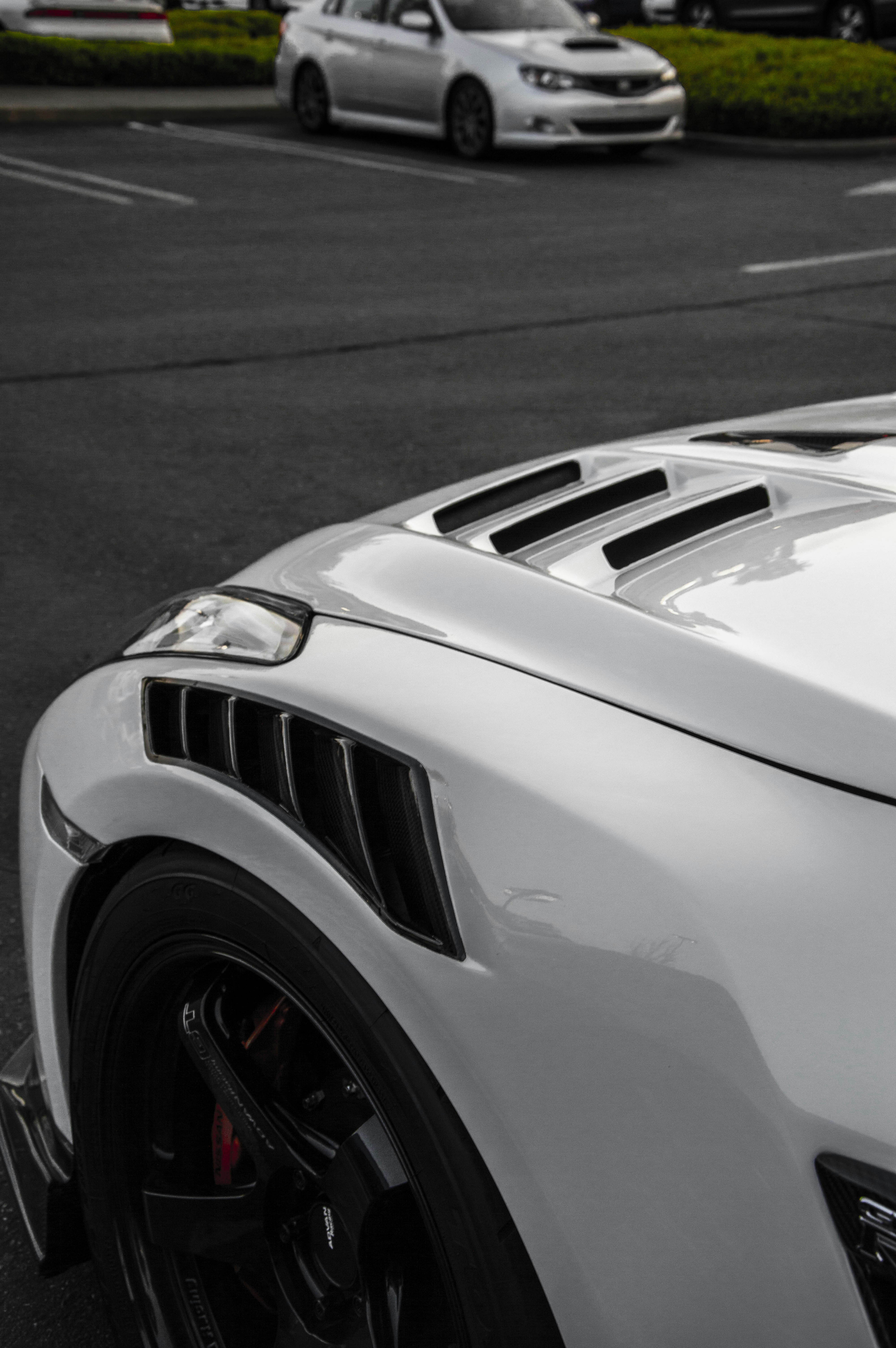 Car bumper and fender body parts ready for installation
