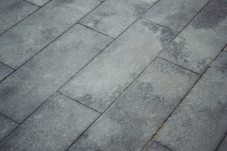 Grey pavement bricks arranged diagonally