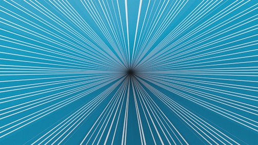 Lines converge on a dark point, creating an illusion.