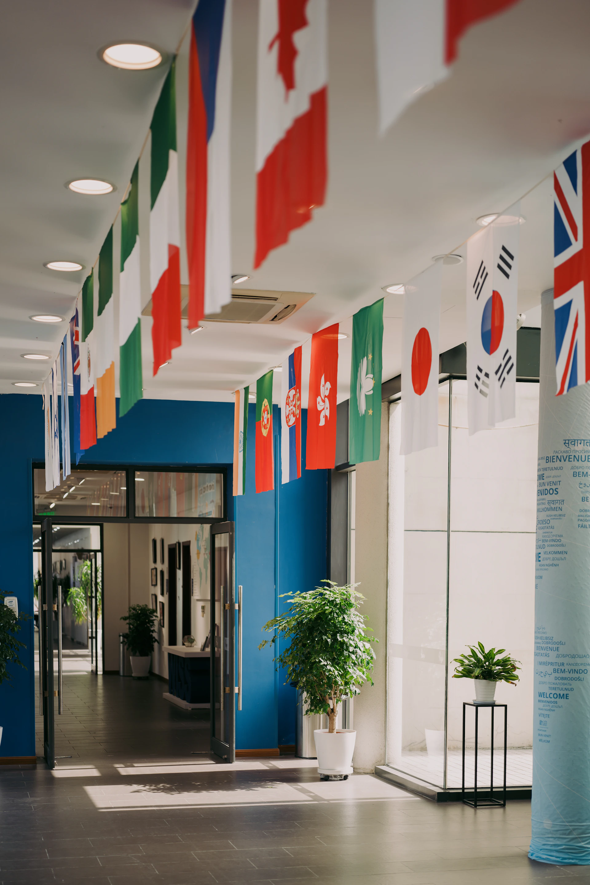 Flags of many nations hang inside the building.