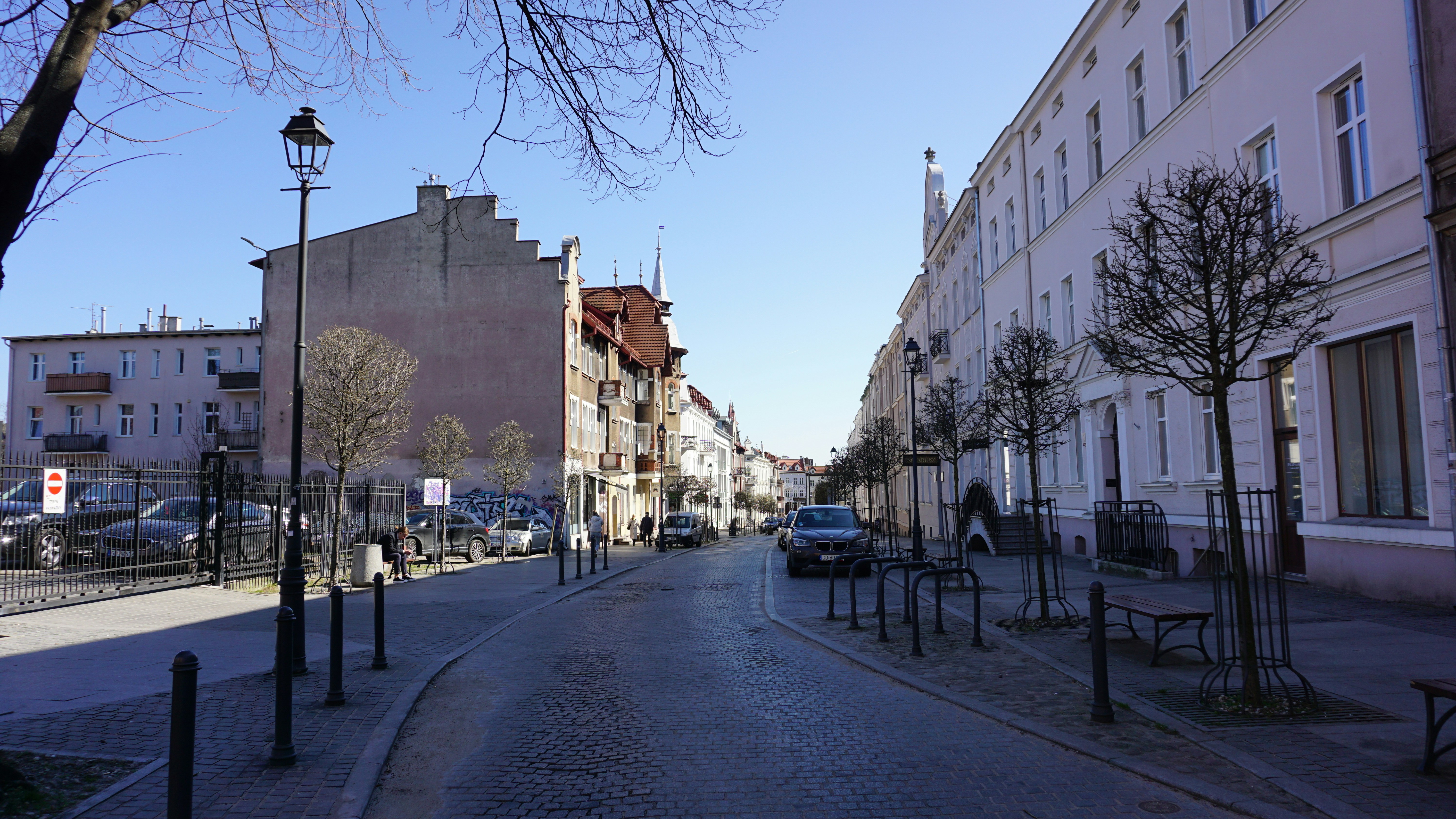 A street with buildings on both sides.