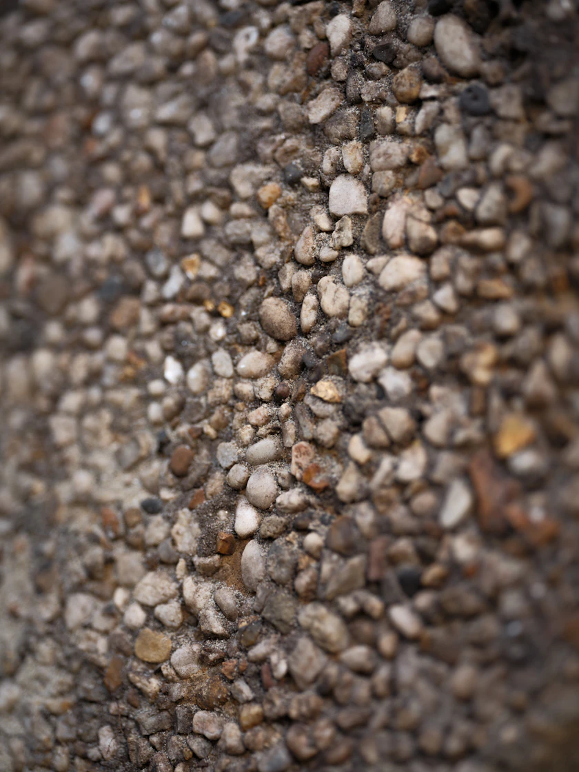 Stone-textured surface illustrating decorative aggregate