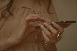 A woman uses her smartphone.