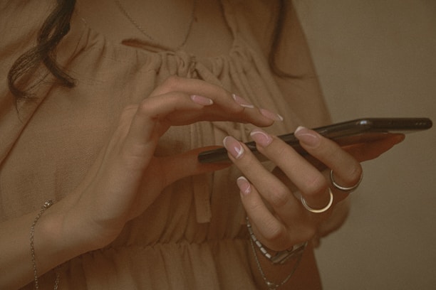 A woman uses her smartphone.