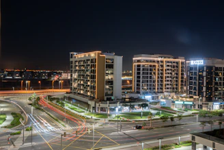Night view of buildings and light trails.