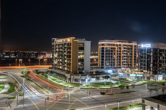 Night view of buildings and light trails.