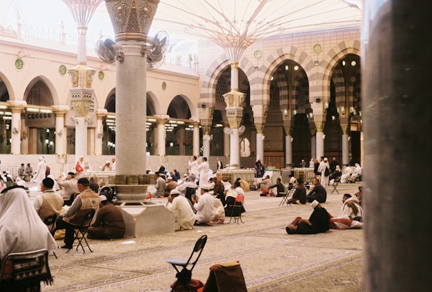 People pray in a beautiful mosque.