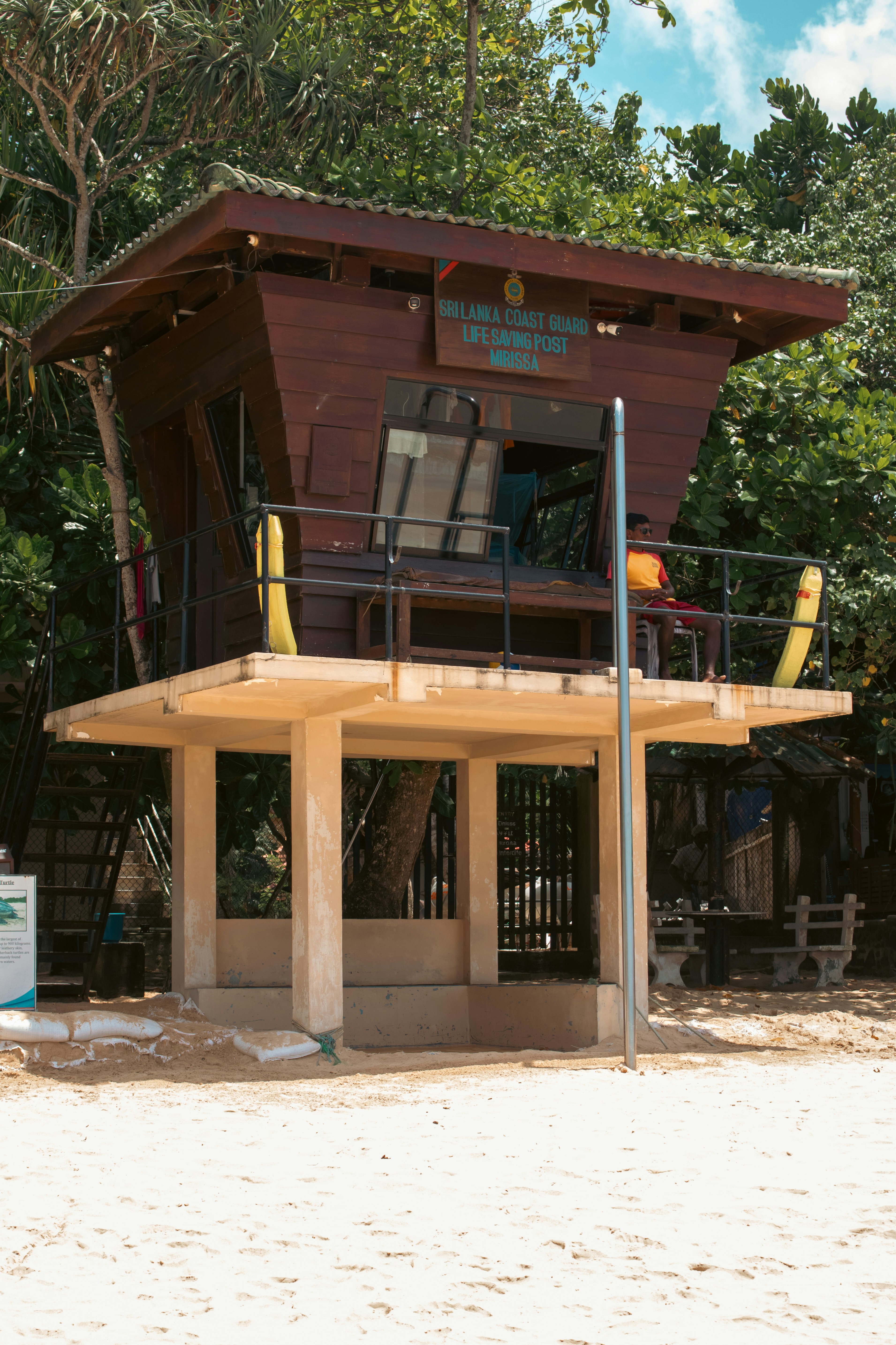 Lifeguard station stands ready on a sunny beach.