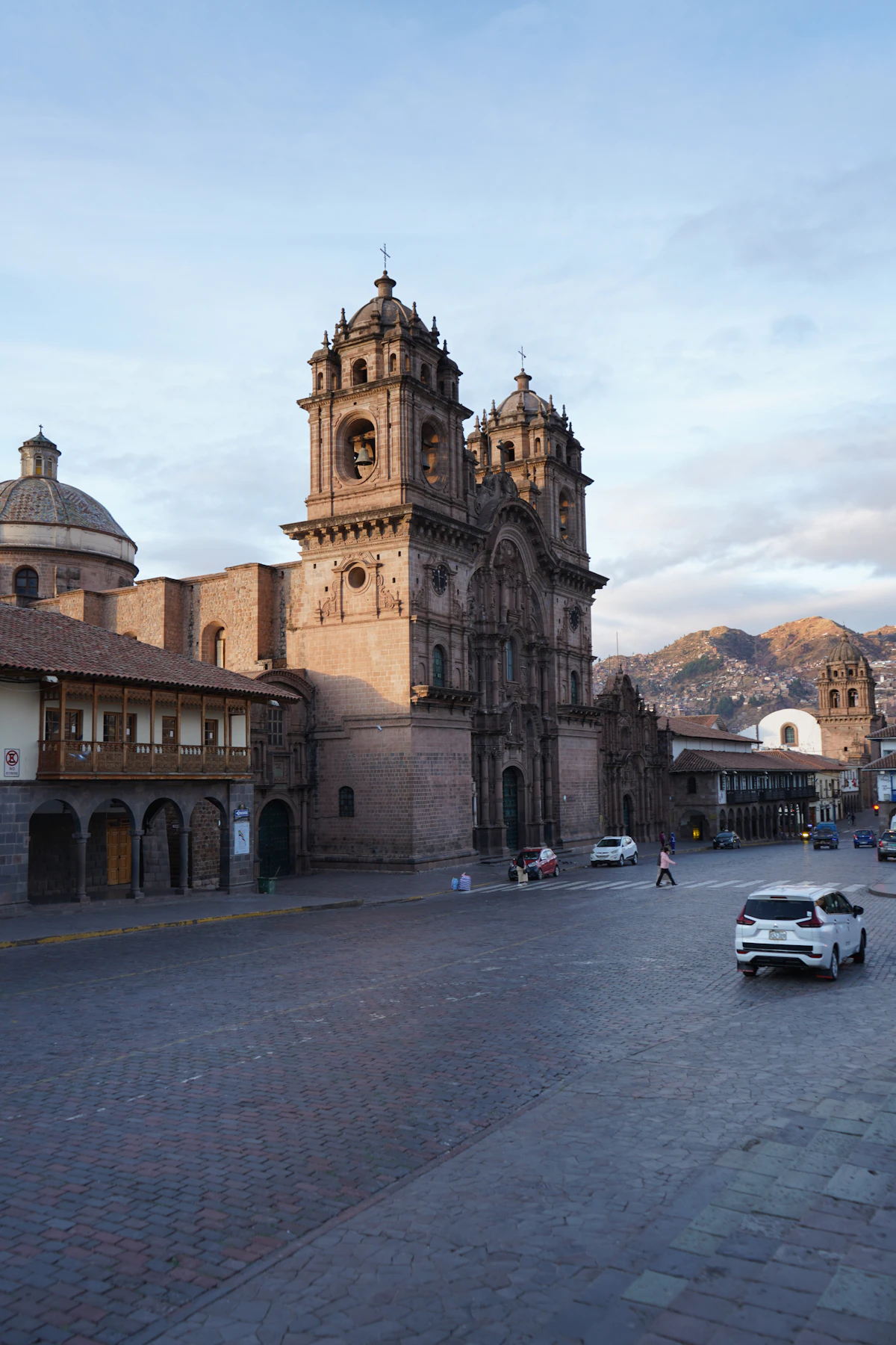 A historic cathedral facing a cobbled Andean square in Cusco