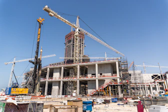 Construction of a large building is in progress.