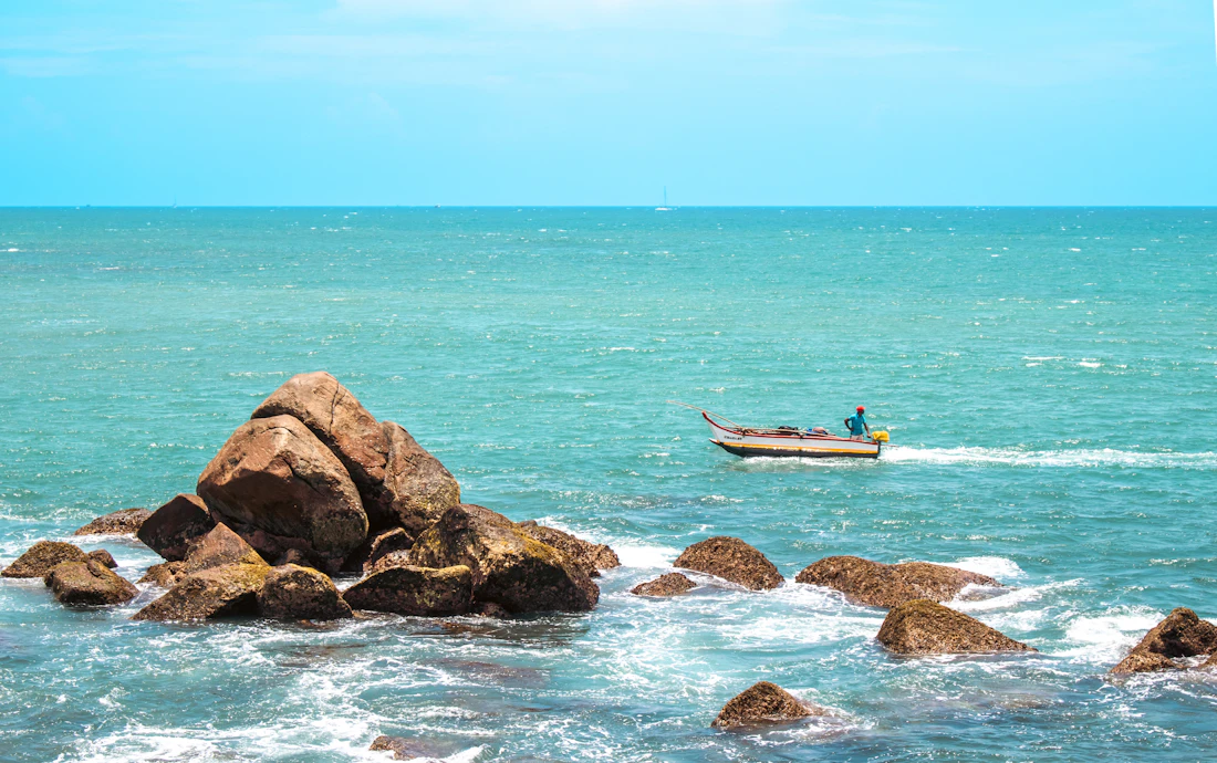 Small fishing boat navigating the Indian Ocean
