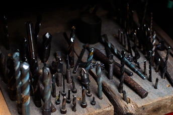 Drill bits neatly organized on a wooden holder