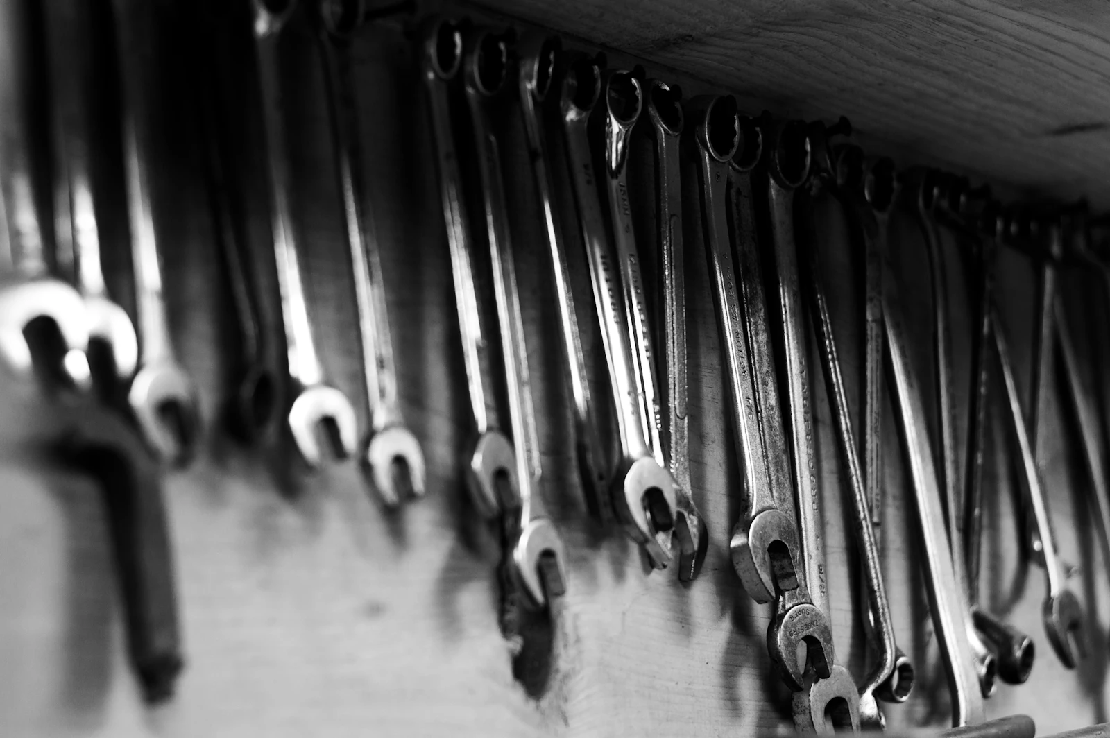 Professional wrench and hand tool setup for mechanical adjustment maintenance and repair