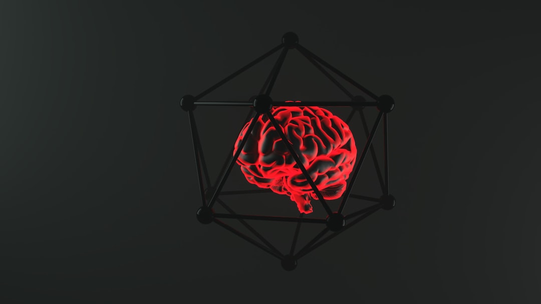 Glowing brain encased in a geometric structure.,