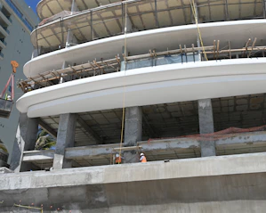 A modern building is under construction.