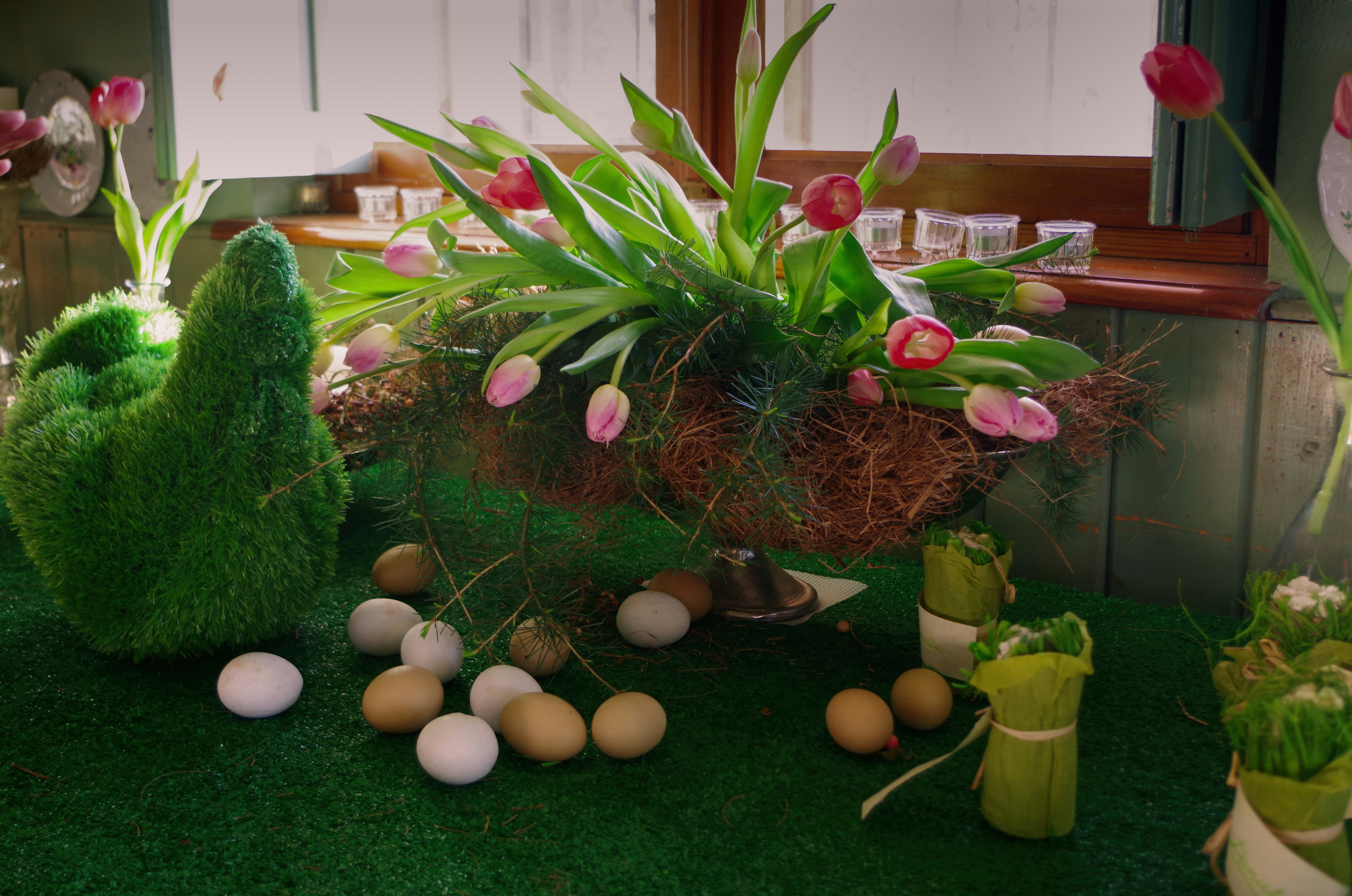 Easter-themed decorations with tulips and eggs.