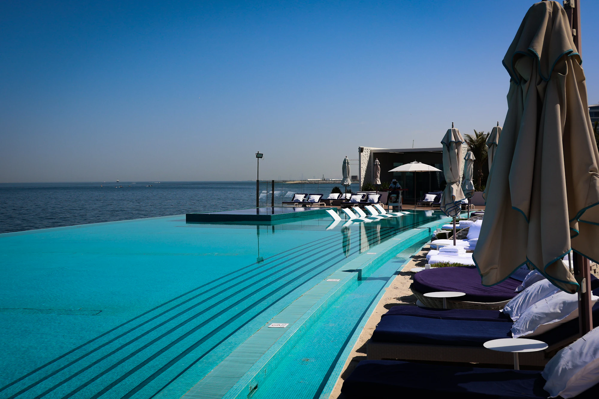 Infinity pool overlooking the sea, Nova Domus real estate agent in Dubai