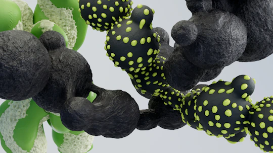 Abstract organic forms in green and black.
